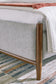 Lyncott California King Upholstered Bed with Mirrored Dresser